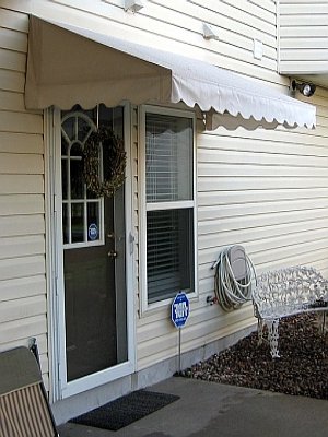 The sidewalk is wet, but the porch is dry!